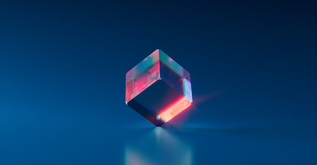 A vibrant and futuristic 3D cube with glowing edges on a dark blue background.